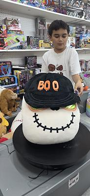 Halloween skeleton plush with BOO hat and green sunglasses